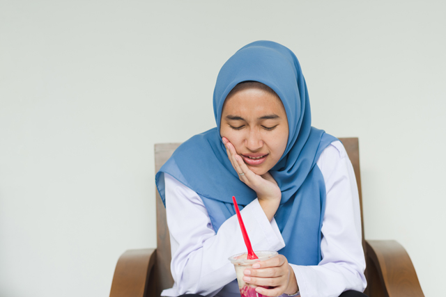 Patient experiencing severe toothache