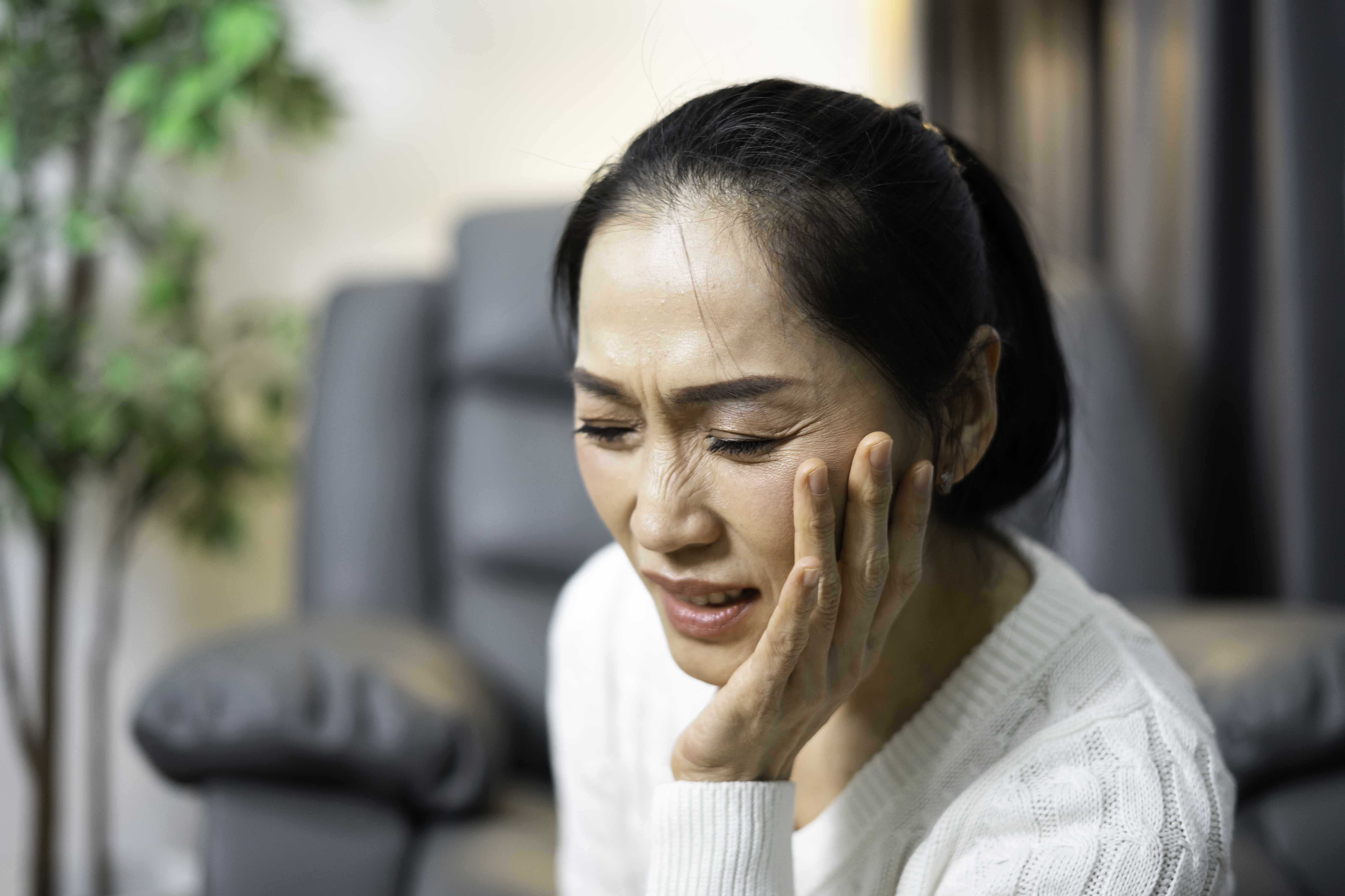 Woman brushing her teeth